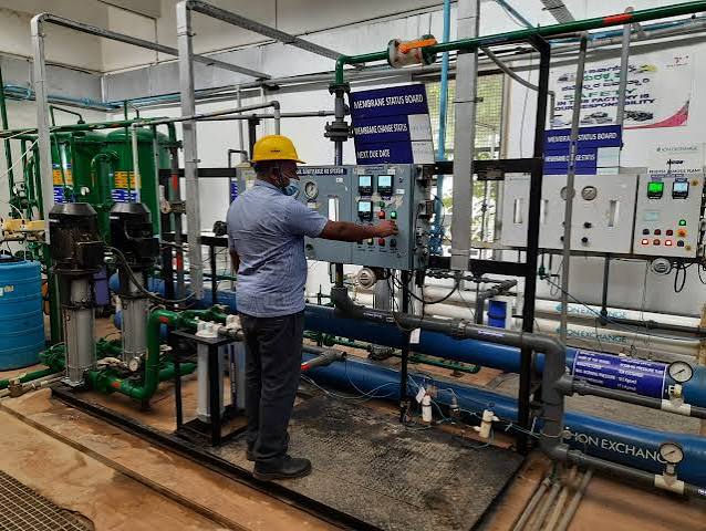 MJTC technician operating industrial water treatment and membrane systems